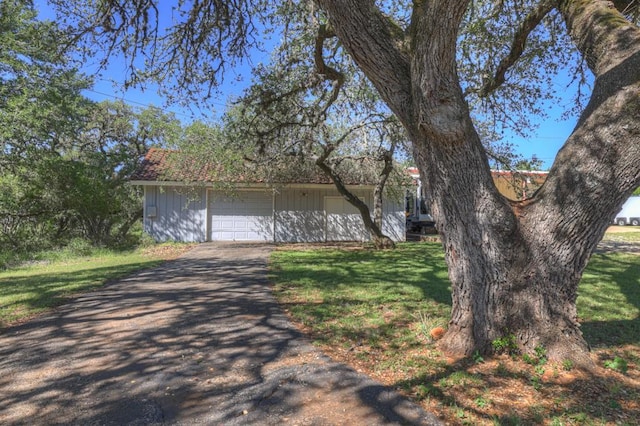 830 Palomino Ln, San Marcos, TX 78666 - view of front of home featuring a front yard and a garage