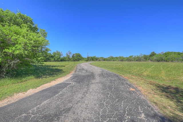830 Palomino Ln, San Marcos, TX 78666 - view of asphalt road with a rural view