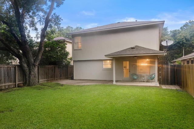 1449 Sir Thopas Trl, Austin, TX 78748 - back of property featuring a patio, a fenced backyard, and a shingled roof