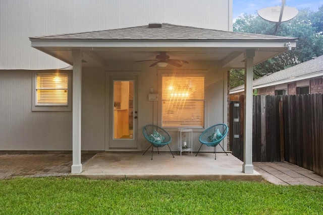 1449 Sir Thopas Trl, Austin, TX 78748 - view of exterior entry with ceiling fan, a patio, and a shingled roof