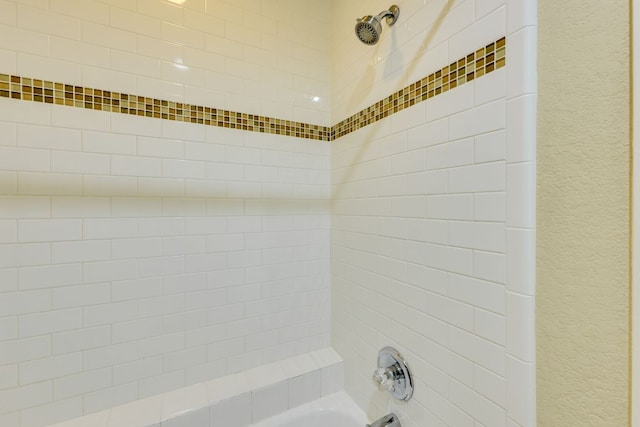 7685 Northcross Dr Unit 907, Austin, TX 78757 - bathroom featuring shower / washtub combination