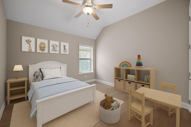 136 Firefall Ln, Austin, TX 78737 - bedroom with vaulted ceiling, wood finished floors, and a ceiling fan
