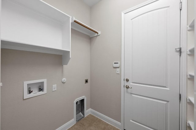136 Firefall Ln, Austin, TX 78737 - laundry area with hookup for a gas dryer, hookup for a washing machine, hookup for an electric dryer, and tile patterned floors