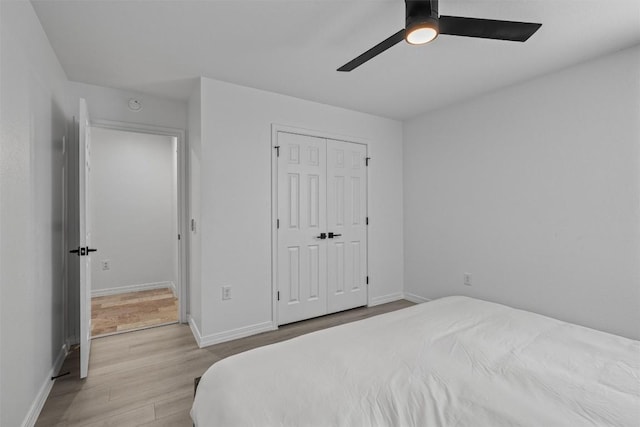 1509 Strickland Dr, Austin, TX 78748 - bedroom featuring wood finished floors, a closet, and ceiling fan