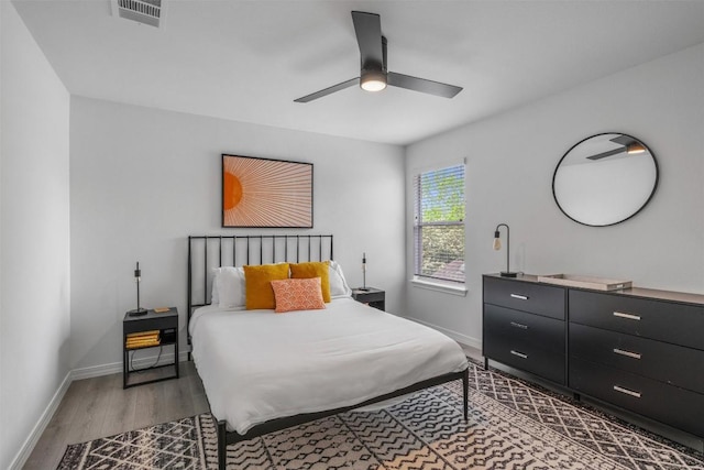1509 Strickland Dr, Austin, TX 78748 - bedroom with wood finished floors and ceiling fan