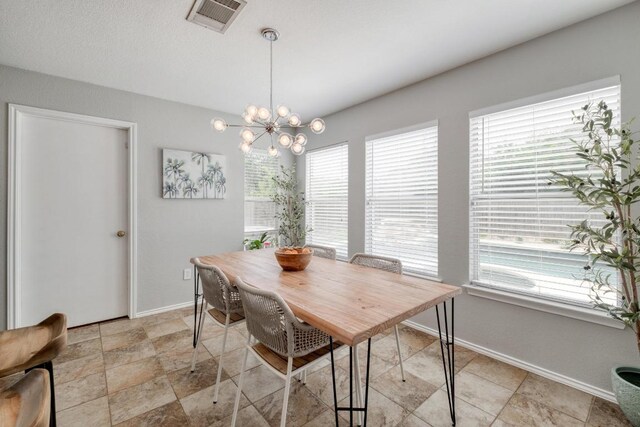1511 Rhapsody Ridge Dr, Cedar Park, TX 78613 - dining space featuring plenty of natural light and a chandelier