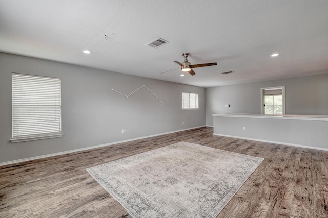 1511 Rhapsody Ridge Dr, Cedar Park, TX 78613 - unfurnished room with wood finished floors, a ceiling fan, and recessed lighting