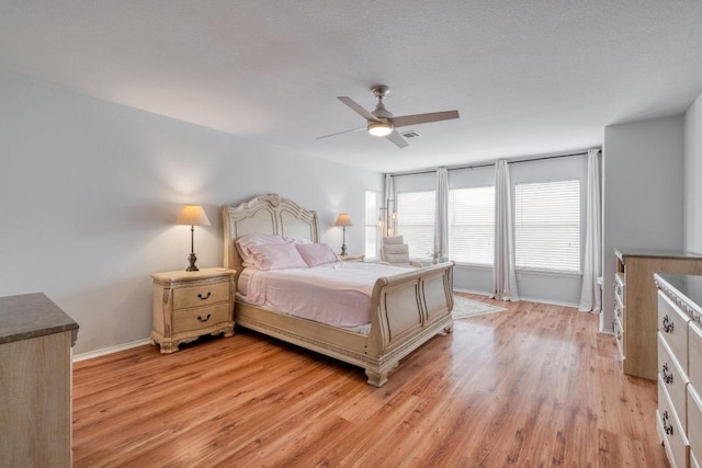 1511 Rhapsody Ridge Dr, Cedar Park, TX 78613 - bedroom with light wood-style flooring and a ceiling fan