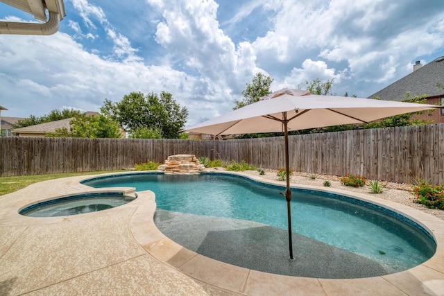 1511 Rhapsody Ridge Dr, Cedar Park, TX 78613 - view of swimming pool featuring a fenced backyard and a pool with connected hot tub