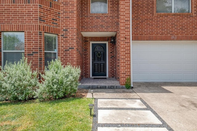 1511 Rhapsody Ridge Dr, Cedar Park, TX 78613 - doorway to property with brick siding, driveway, and a garage