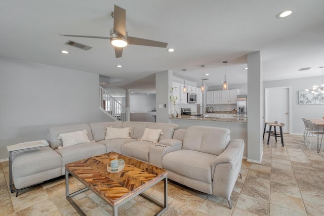 1511 Rhapsody Ridge Dr, Cedar Park, TX 78613 - living area featuring ceiling fan, recessed lighting, a chandelier, and stairway