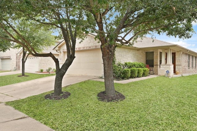 11012 Short Springs Dr, Austin, TX 78754 - view of front of home featuring driveway, an attached garage, and a front lawn