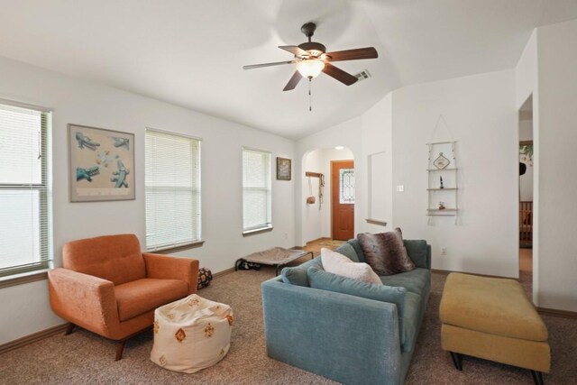 11012 Short Springs Dr, Austin, TX 78754 - carpeted living area with a ceiling fan, arched walkways, plenty of natural light, and vaulted ceiling