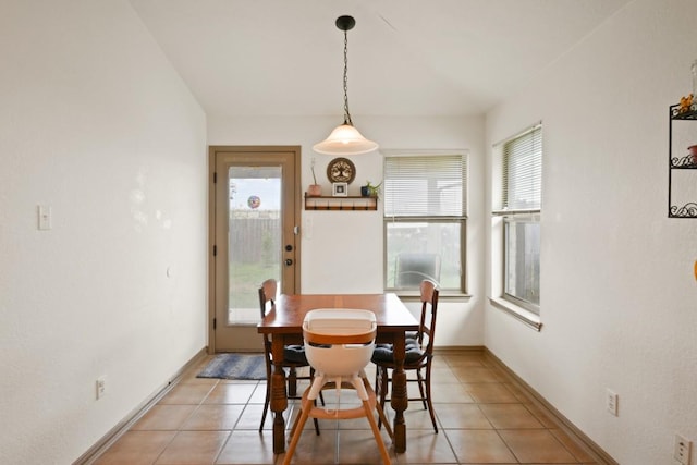 11012 Short Springs Dr, Austin, TX 78754 - dining room featuring healthy amount of natural light and light tile patterned floors