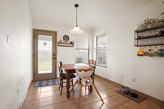 11012 Short Springs Dr, Austin, TX 78754 - dining room featuring baseboards and light tile patterned floors