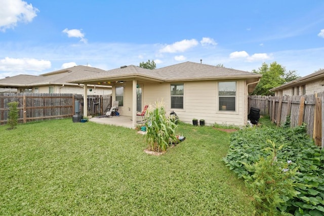 11012 Short Springs Dr, Austin, TX 78754 - back of property featuring a fenced backyard and a patio area