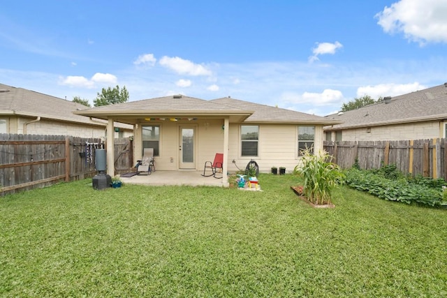 11012 Short Springs Dr, Austin, TX 78754 - back of property with a patio and a fenced backyard