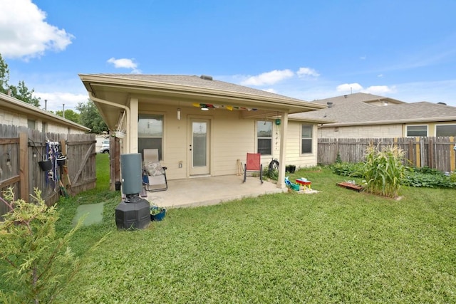 11012 Short Springs Dr, Austin, TX 78754 - rear view of house with a patio area and a fenced backyard