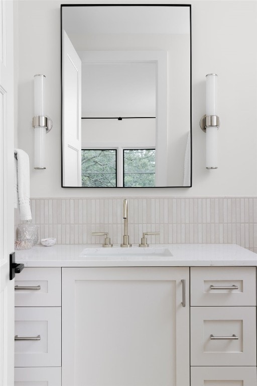 4100 Mcbrine Pl, Austin, TX 78746 - bathroom with vanity and tasteful backsplash