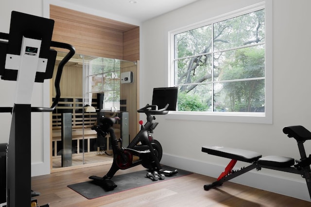 4100 Mcbrine Pl, Austin, TX 78746 - exercise room featuring wood finished floors and baseboards