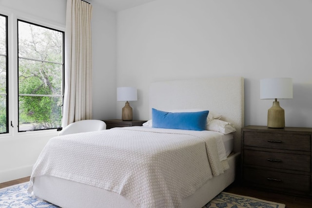 4100 Mcbrine Pl, Austin, TX 78746 - bedroom with multiple windows and wood finished floors