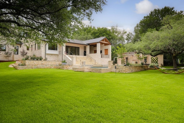 4100 Mcbrine Pl, Austin, TX 78746 - back of house with a yard, a metal roof, and brick siding