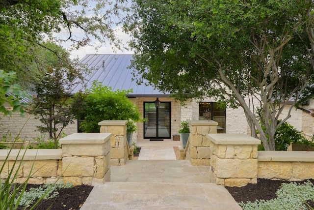 4100 Mcbrine Pl, Austin, TX 78746 - view of front of home featuring a standing seam roof and a metal roof