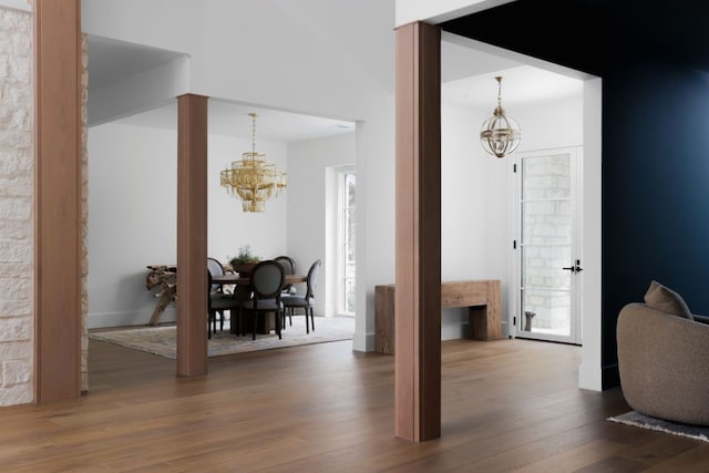 4100 Mcbrine Pl, Austin, TX 78746 - entryway featuring a chandelier and wood finished floors