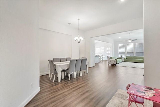 817 Clear Spring Ln, Leander, TX 78641 - dining space with a chandelier, wood finished floors, and a ceiling fan