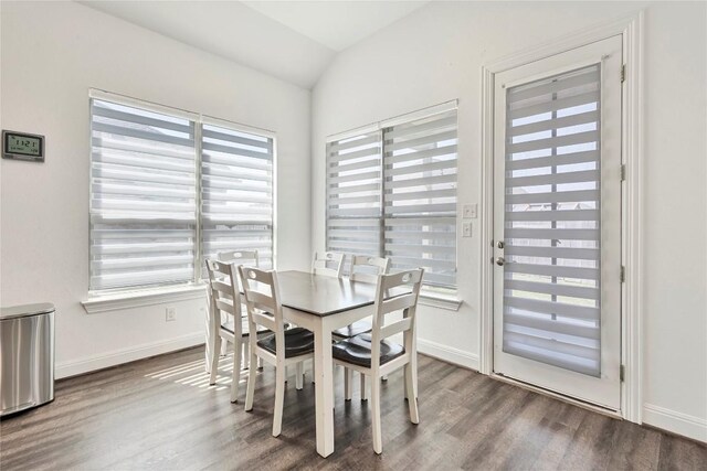 817 Clear Spring Ln, Leander, TX 78641 - dining room with wood finished floors and lofted ceiling