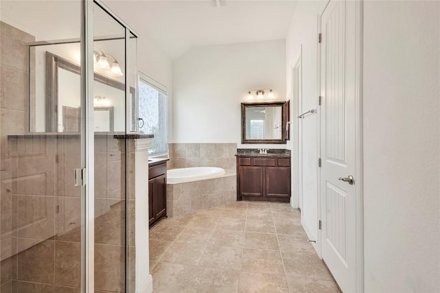817 Clear Spring Ln, Leander, TX 78641 - bathroom featuring vanity, a garden tub, a shower stall, and tile patterned flooring