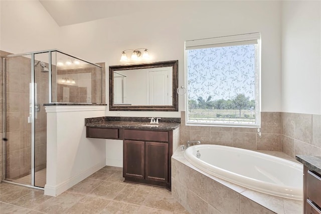 817 Clear Spring Ln, Leander, TX 78641 - full bath featuring a garden tub, a shower stall, vanity, and tile patterned flooring