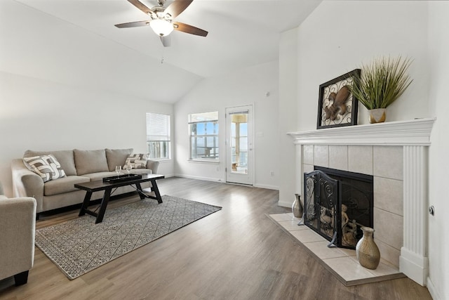 107 Chandler View Trl, Round Rock, TX 78665 - living room with a fireplace, lofted ceiling, wood finished floors, and ceiling fan