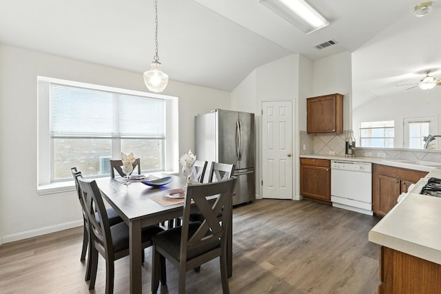 107 Chandler View Trl, Round Rock, TX 78665 - dining space with lofted ceiling, wood finished floors, and a ceiling fan