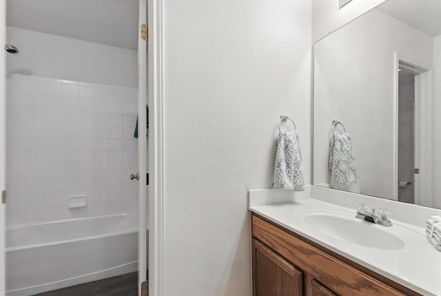 107 Chandler View Trl, Round Rock, TX 78665 - bathroom featuring vanity, shower / washtub combination, and a textured wall