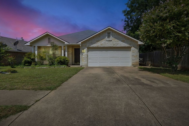107 Chandler View Trl, Round Rock, TX 78665 - ranch-style house featuring driveway, a garage, and stone siding