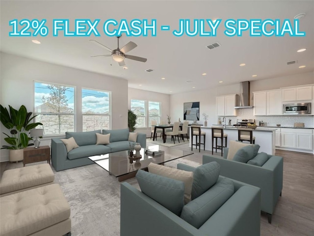 1531 N Red Bud Ln Unit 29, Round Rock, TX 78665 - living area featuring ceiling fan, recessed lighting, and wood finished floors