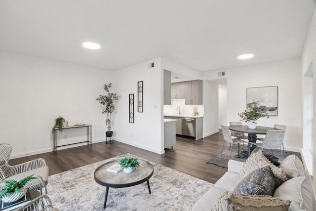 707 Mason St, Leander, TX 78641 - living area featuring dark wood finished floors and recessed lighting
