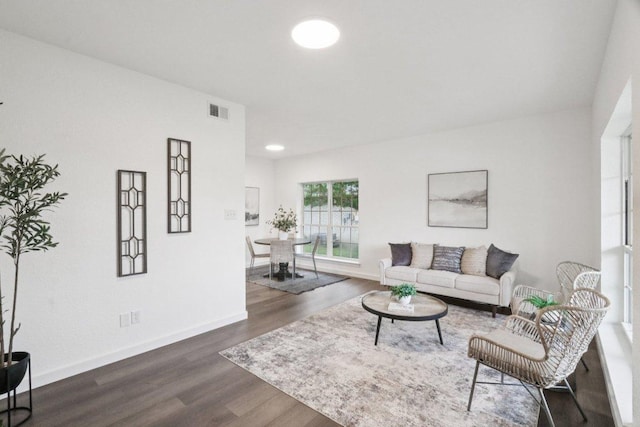 707 Mason St, Leander, TX 78641 - living area featuring dark wood-style flooring and recessed lighting