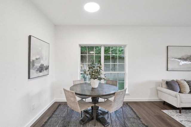 707 Mason St, Leander, TX 78641 - dining space with dark wood finished floors and baseboards