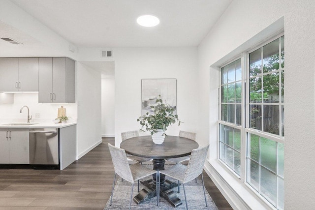 707 Mason St, Leander, TX 78641 - dining area with dark wood finished floors and healthy amount of natural light