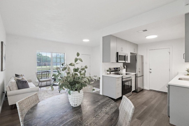 707 Mason St, Leander, TX 78641 - dining room featuring dark wood-type flooring