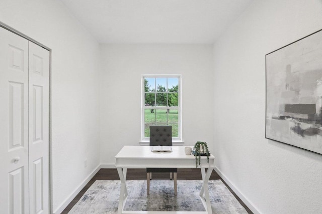 707 Mason St, Leander, TX 78641 - home office featuring dark wood finished floors and baseboards