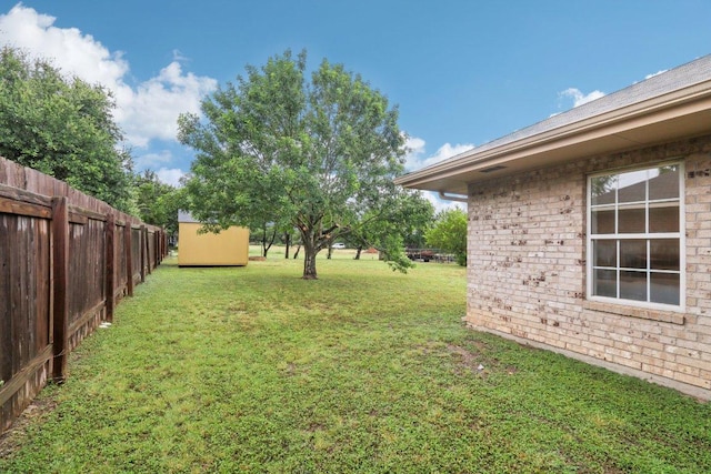 707 Mason St, Leander, TX 78641 - view of yard featuring a storage unit