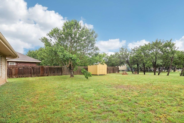 707 Mason St, Leander, TX 78641 - fenced backyard featuring a shed