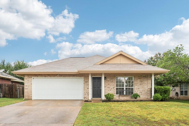 707 Mason St, Leander, TX 78641 - single story home featuring concrete driveway, a garage, and brick siding