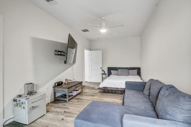 11300 Lake Dr, Austin, TX 78748 - bedroom featuring light wood-type flooring and ceiling fan