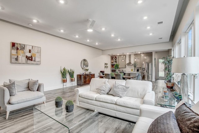 11300 Lake Dr, Austin, TX 78748 - living room with light wood-style floors, recessed lighting, and ceiling fan