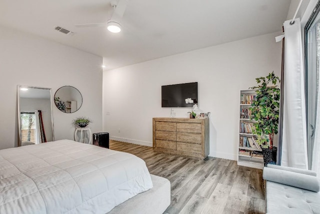11300 Lake Dr, Austin, TX 78748 - bedroom featuring wood finished floors and ceiling fan