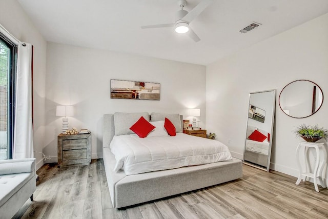 11300 Lake Dr, Austin, TX 78748 - bedroom featuring light wood finished floors and a ceiling fan